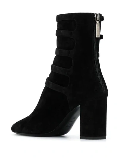 Shop Saint Laurent Lou Buckle Detail Ankle Boots In Black