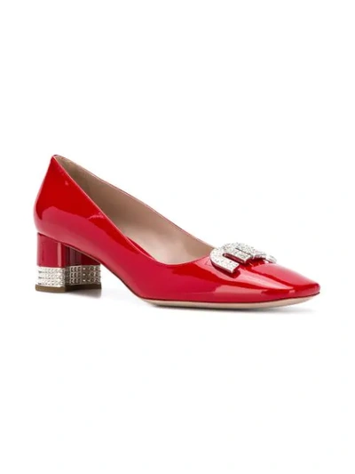 Shop Miu Miu Embellished Pumps - Red