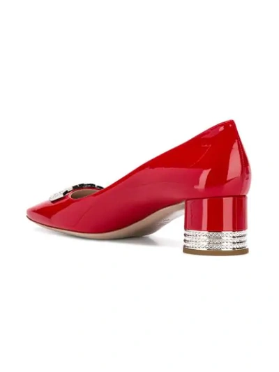 Shop Miu Miu Embellished Pumps - Red