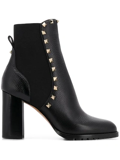 Shop Valentino Rockstud Ankle Boots In Black