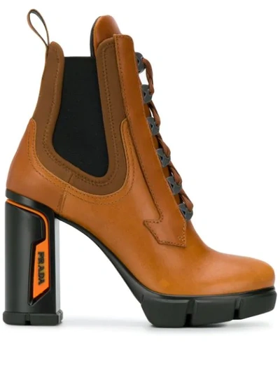 Shop Prada Heeled Lace-up Ankle Boots In Brown