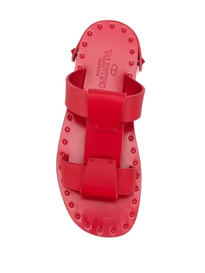 Shop Valentino Rockstud Flat Sandals In Red