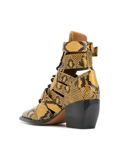 Shop Chloé Python Print Rylee Boots In Yellow