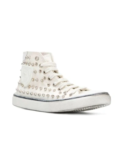 Shop Saint Laurent Bedford Studded Sneakers In White