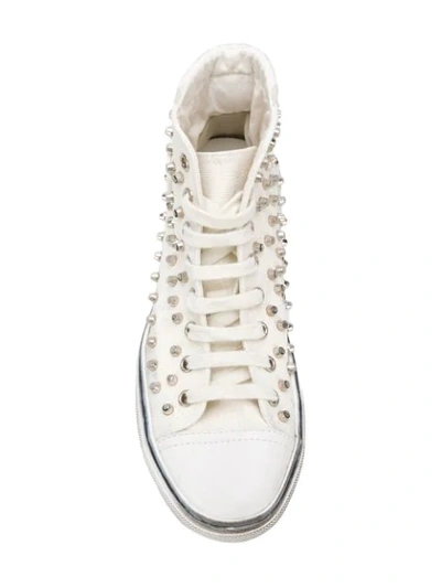 Shop Saint Laurent Bedford Studded Sneakers In White
