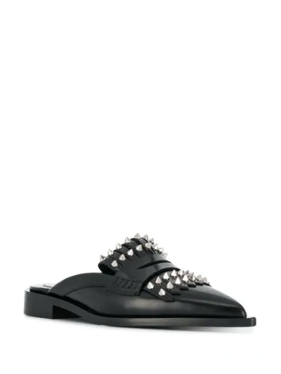 Shop Alexander Mcqueen Kiltie Studded Mules In Black