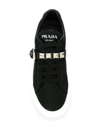 Shop Prada Studded Strap Sneakers In Black