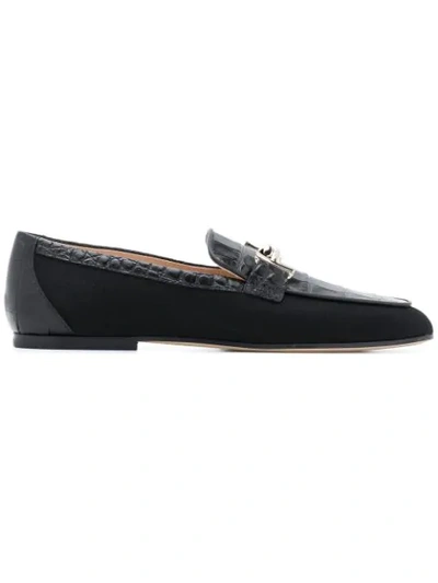 Shop Tod's Flat Appliqué Loafers In Black