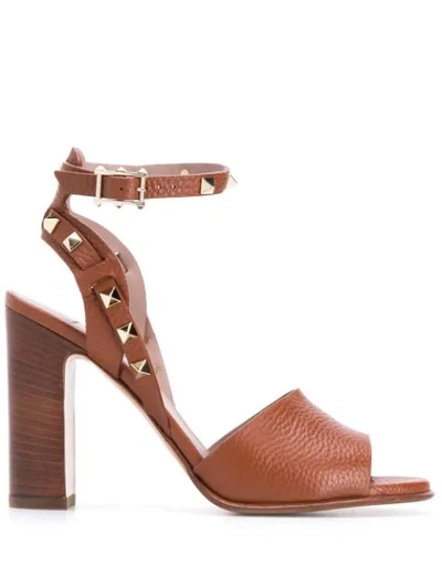 Shop Valentino Garavani Rockstud Sandals - Brown