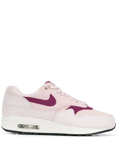 Shop Nike Air Max 1 Sneakers In Pink