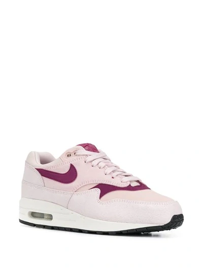 Shop Nike Air Max 1 Sneakers In Pink