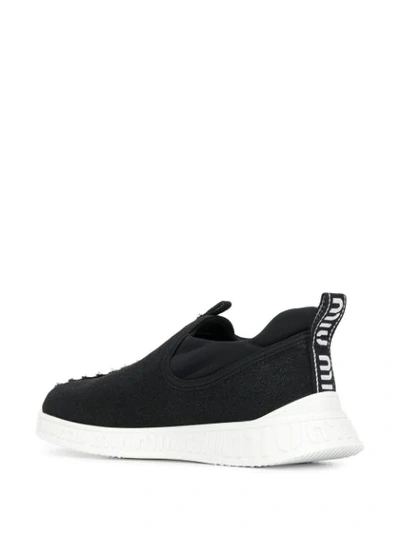 Shop Miu Miu Embellished Slip-on Sneakers In Black