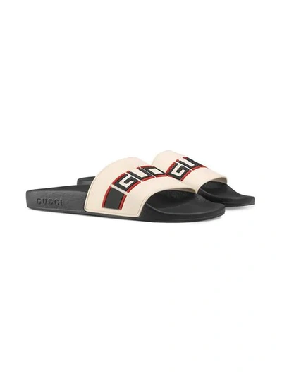Shop Gucci Embossed Logo Pool Slides In White