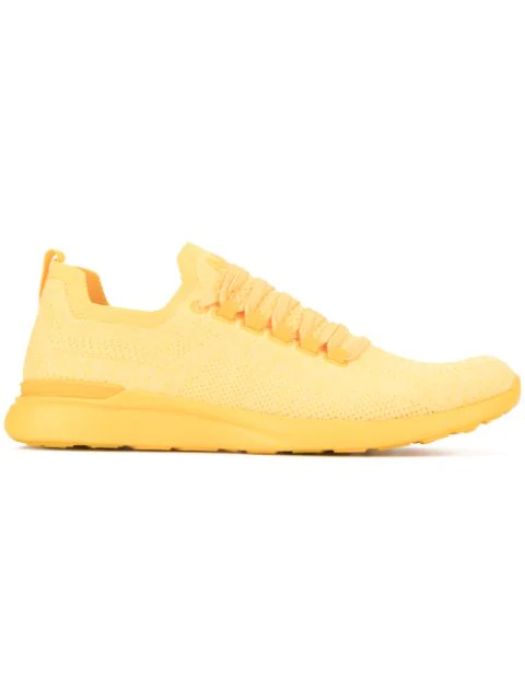 yellow apl sneakers