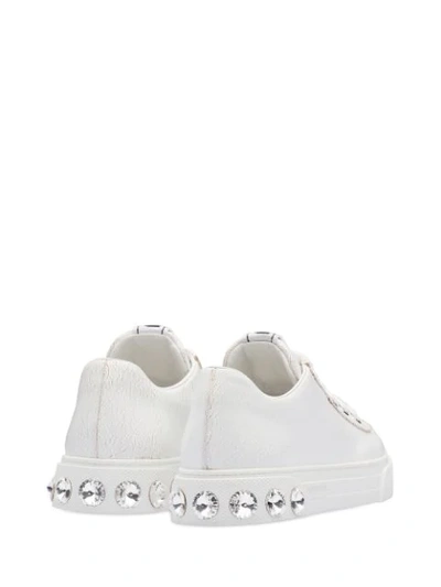 Shop Miu Miu Crystal Studded Low Sneakers In White