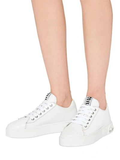 Shop Miu Miu Crystal Studded Low Sneakers In White