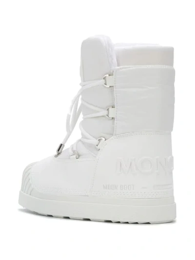 Shop Moncler Lace-up Moon Boots In White