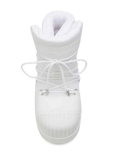 Shop Moncler Lace-up Moon Boots In White