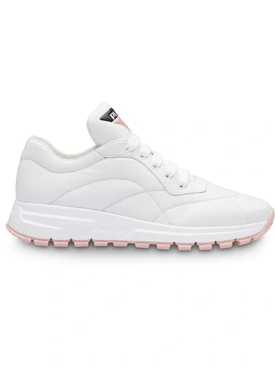 Shop Prada Top Stitched Runner Sneakers In White