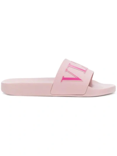 Shop Valentino Vltn Slides In Pink