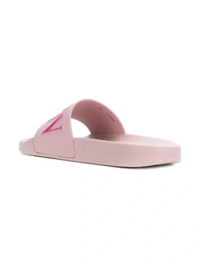 Shop Valentino Vltn Slides In Pink