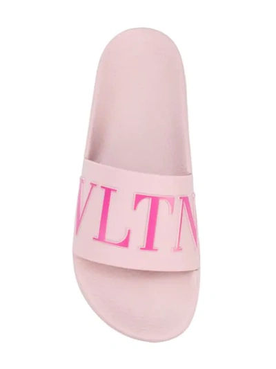 Shop Valentino Vltn Slides In Pink