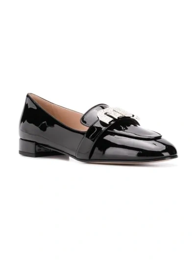 Shop Miu Miu Embellished Logo Loafers In Black