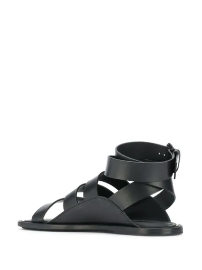 Shop Ann Demeulemeester Flat Buckle Fastening Sandals In Black
