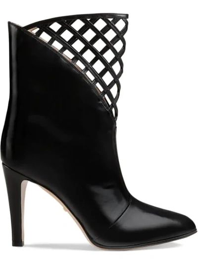 Shop Gucci Cutout Leather Ankle Boot In Black