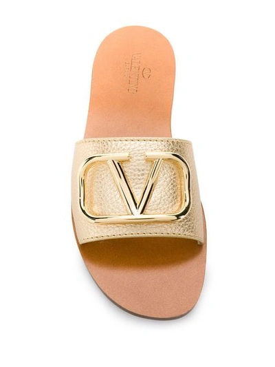Shop Valentino Garavani Vlogo Slides - Gold