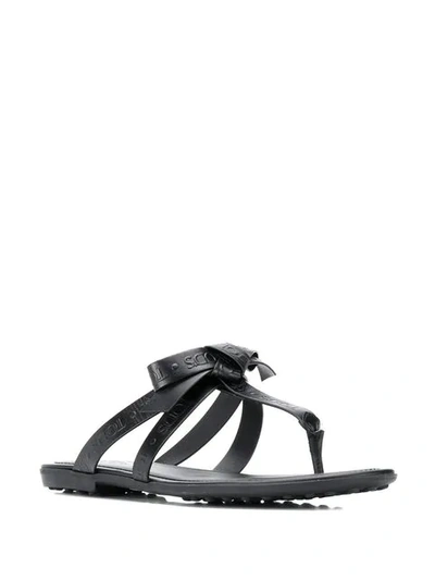 Shop Tod's Embossed Logo Flat Sandals In Black