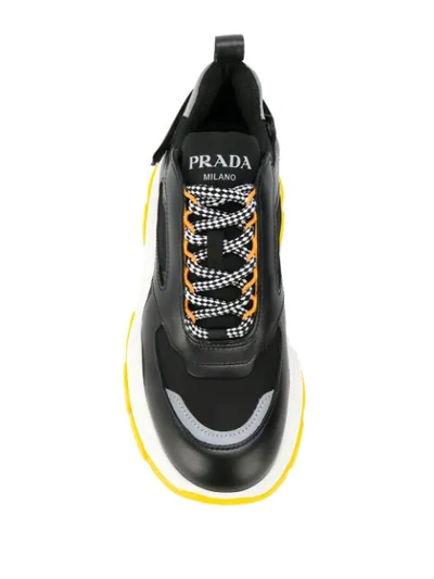 Shop Prada Pegasus Chunky Sneakers In Black