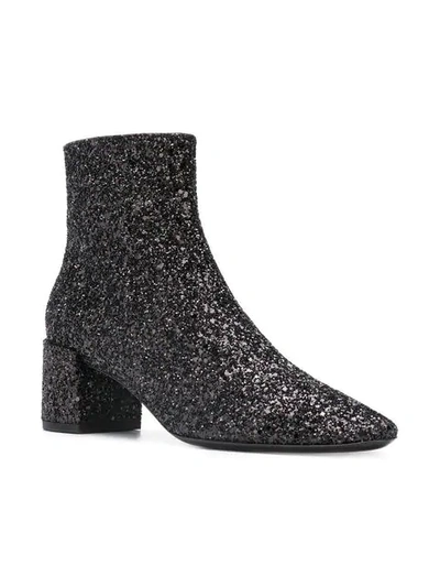 Shop Saint Laurent Lou Sequin Boots In Black