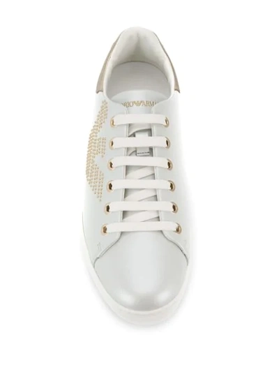 Shop Emporio Armani Studded Logo Sneakers In White