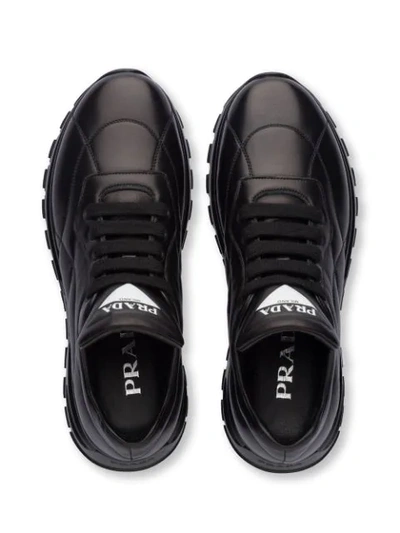 Shop Prada Leather Sneakers In F0002 Black