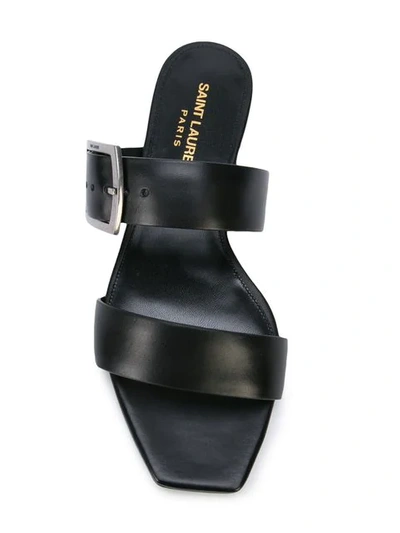 Shop Saint Laurent Buckle Flat Sandals In Black