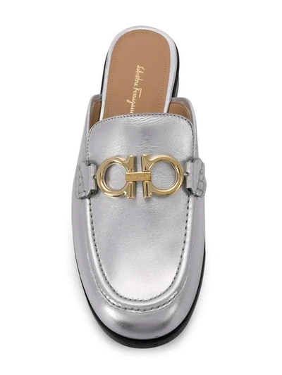 Shop Ferragamo Mules Mit Gancini-detail In Silver