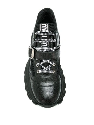 Shop Miu Miu Buckle Strap Chunky Sneakers In Black