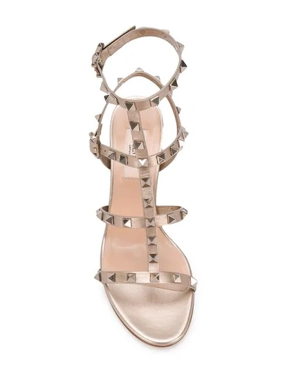 Shop Valentino Rockstud Sandals In Metallic