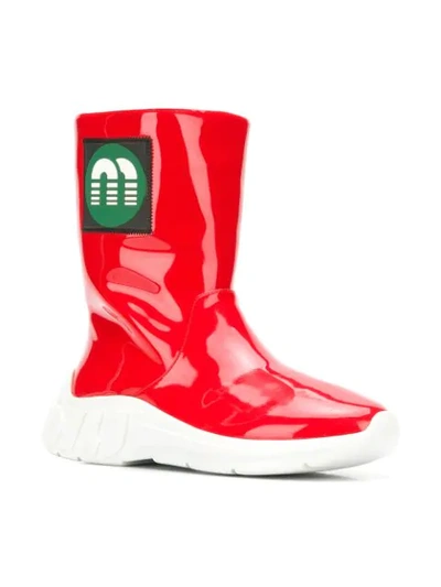 Shop Miu Miu Logo Patch Boots In Red