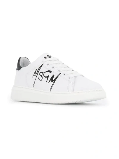 Shop Msgm Spray Logo Print Sneakers In White
