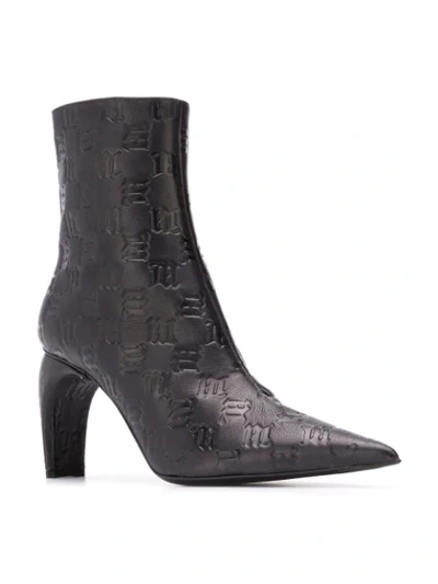 Shop Misbhv Embossed Monogram Boots In Black