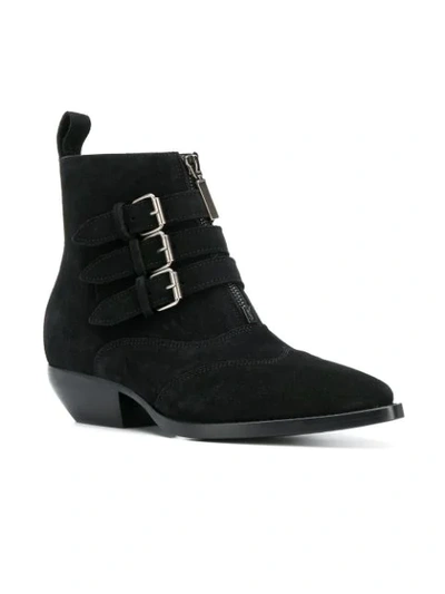 Shop Saint Laurent Buckled Ankle Boots In Black