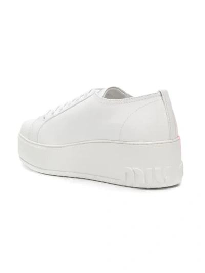 Shop Miu Miu Side Logo Sneakers In White