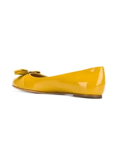 Shop Ferragamo Vara Ballerina Shoes In Yellow