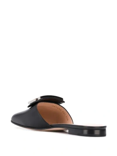 Shop Gucci G Embellished Mules In Black