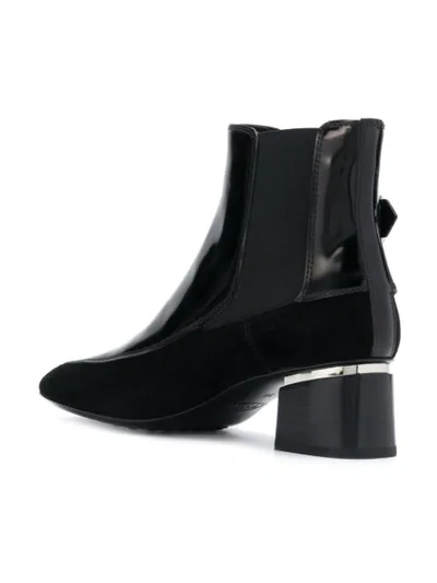 Shop Tod's Buckle Ankle Boots In B999 - Black