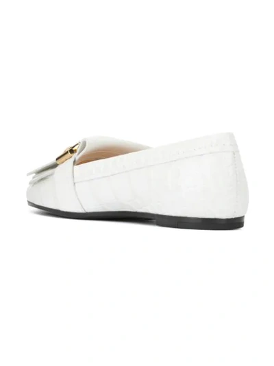 Shop Tod's Fringed Trim Loafers In White