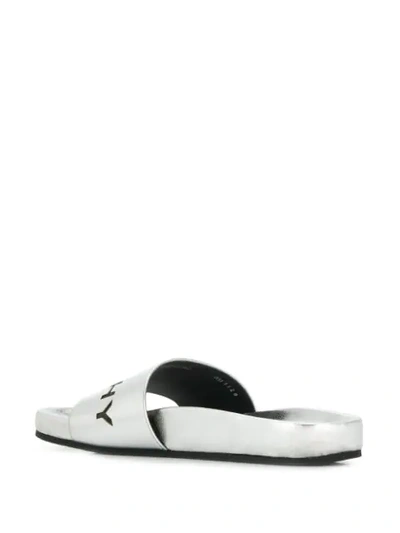 Shop Givenchy Branded Slides In 040