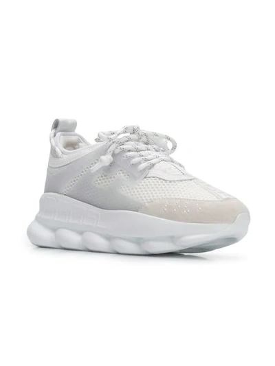 Shop Versace Chain Reaction Sneakers In White